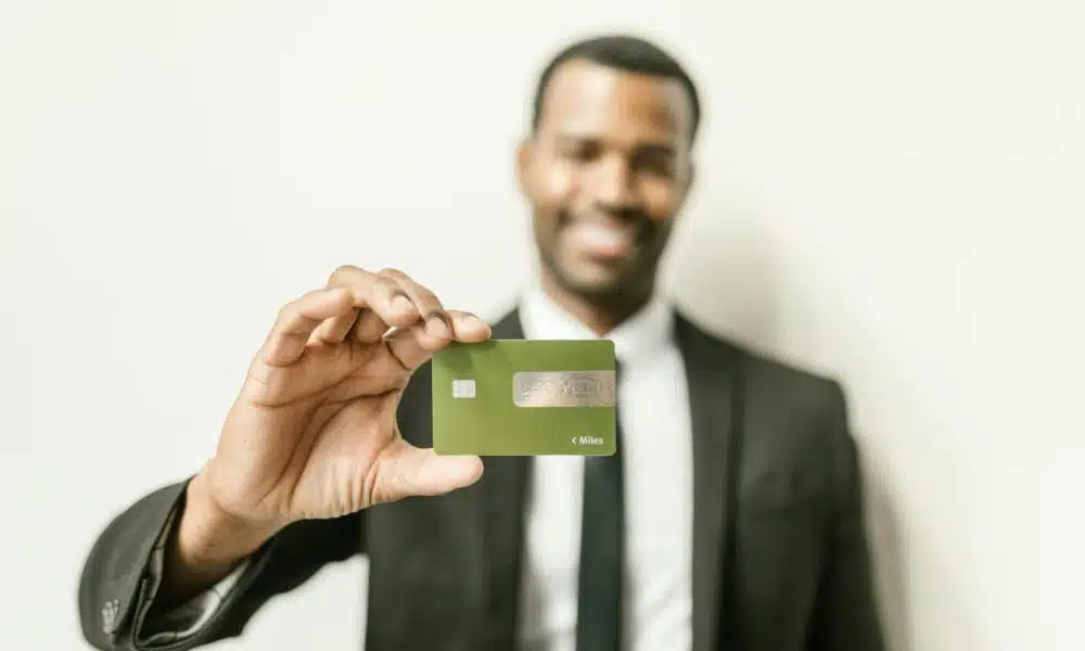 A Man Holding a Card