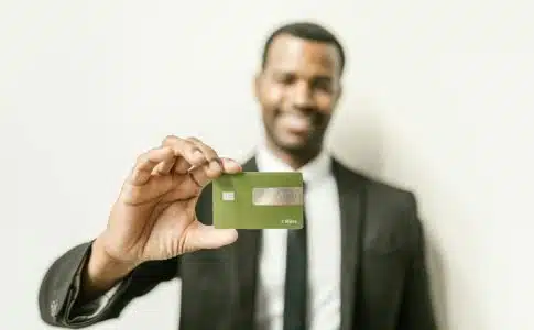 A Man Holding a Card